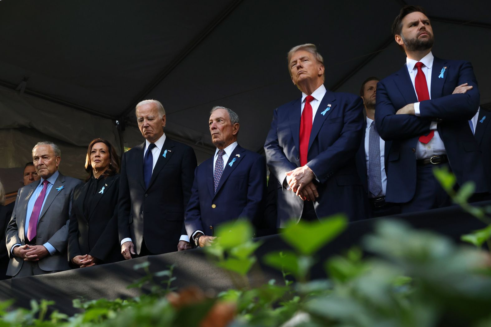 From left, Senate Majority Leader Chuck Schumer, Vice President Kamala Harris, President Joe Biden, former New York Mayor Michael Bloomberg, former President Donald Trump and US Sen. JD Vance attend a ceremony in New York <a >marking the 23rd anniversary of the September 11 attacks</a>.