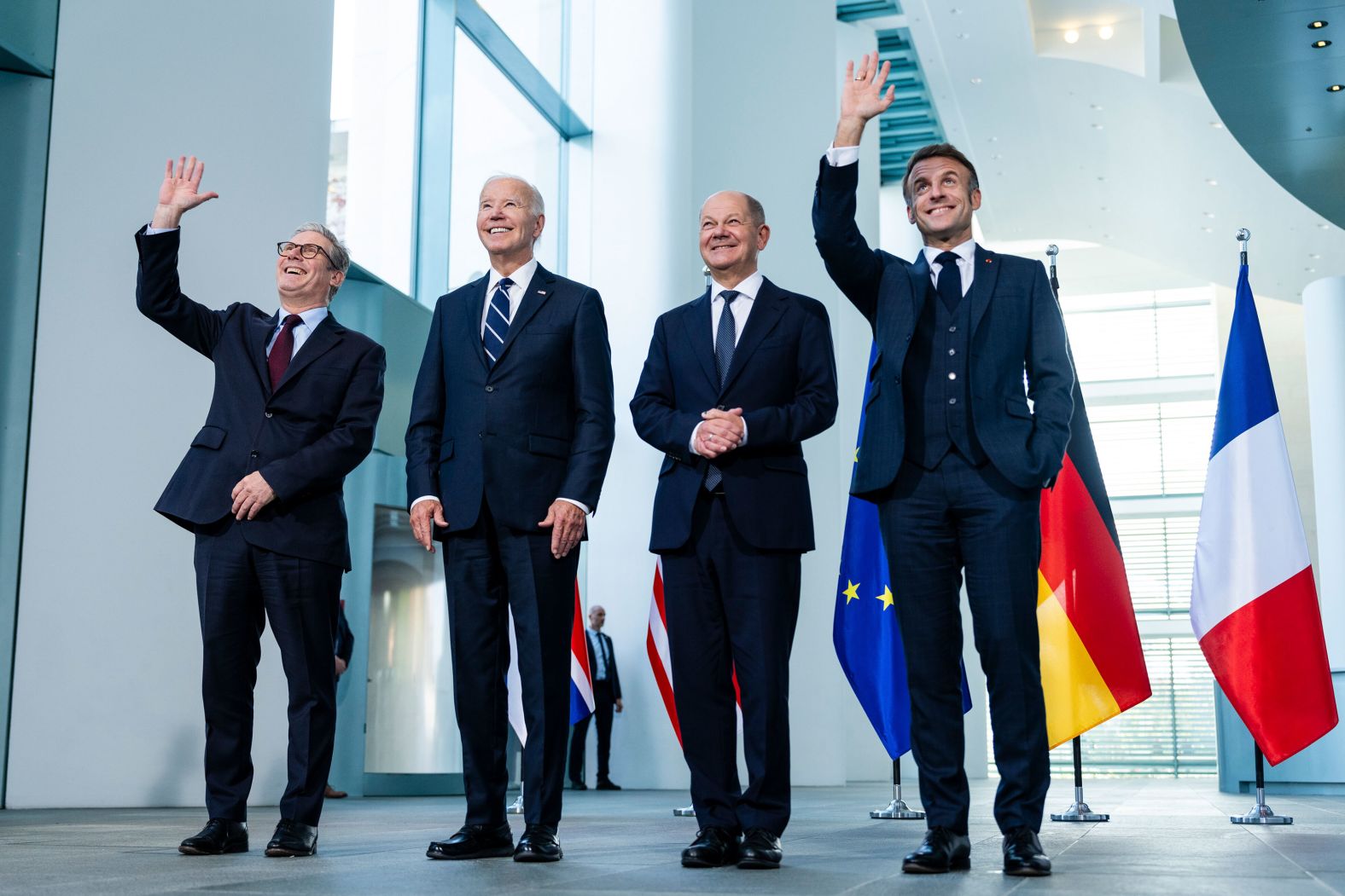 From left, British Prime Minister Keir Starmer, US President Joe Biden, German Chancellor Olaf Scholz and French President Emmanuel Macron pose for a photo at the Chancellery in Berlin on Friday, October 18. Biden urged Germany and other Western allies not to waver in their support for Ukraine, using what may be his final trip to Europe as president to bolster the grueling fight against Russia's invasion.