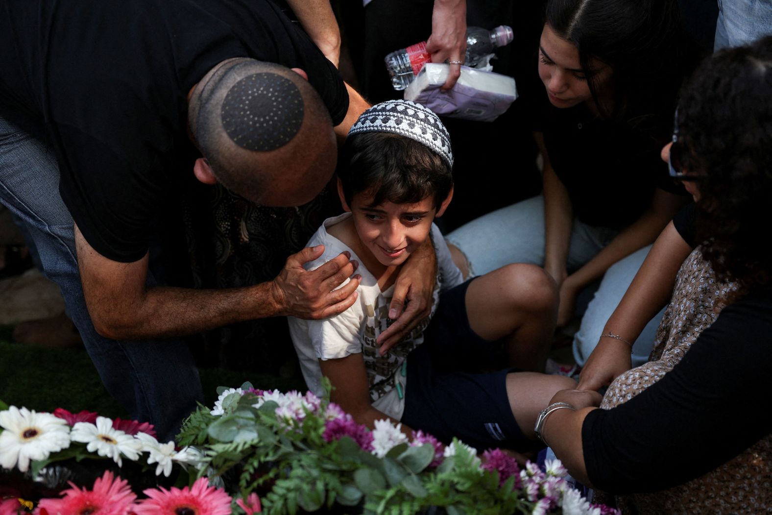 People mourn Israeli Capt. Elad Siman Tov during his funeral in Petah Tikva, Israel, on Friday, October 18. He was among <a href="index.php?page=&url=https%3A%2F%2Fwww.cnn.com%2Fworld%2Flive-news%2Fisrael-iran-gaza-lebanon-10-17-24-intl-hnk%23cm2dst98l00003b6nxjh7onwq">five Israeli soldiers killed</a> during military operations in southern Lebanon on October 17. Israeli forces have been carrying out <a href="index.php?page=&url=https%3A%2F%2Fwww.cnn.com%2F2024%2F10%2F01%2Fmiddleeast%2Fisrael-ground-incursion-lebanon-explainer-intl-hnk%2Findex.html">ground operations in southern Lebanon</a> as it targets the Iran-backed militant group Hezbollah.