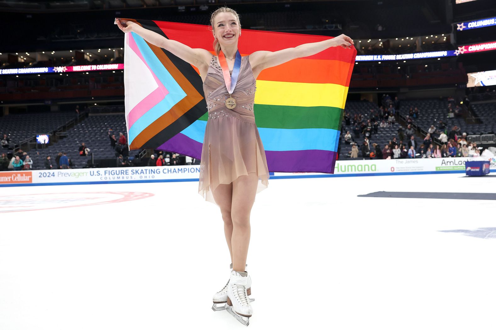 Amber Glenn poses with the Progress Pride flag after winning the singles title at the US Figure Skating Championships on Friday, January 26. <a href="index.php?page=&url=https%3A%2F%2Fwww.dispatch.com%2Fstory%2Fsports%2Folympics%2F2024%2F01%2F27%2Ffigure-skater-amber-glenn-first-lgbtq-woman-to-win-the-u-s-title%2F72370261007%2F" target="_blank">She’s the first openly LGBTQ+ skater to win the US women’s title</a>.