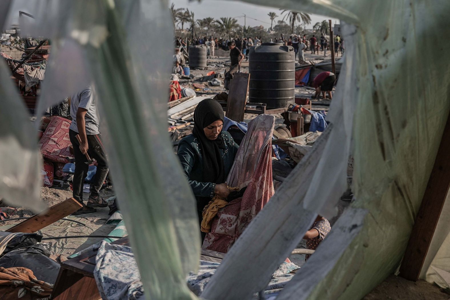 Tents are damaged at a humanitarian zone for displaced people in Khan Younis, Gaza, where <a >an overnight Israeli airstrike killed at least 19 people</a> on Tuesday, September 10, according to the Ministry of Health in Gaza. Israel said the operation targeted Hamas fighters there.