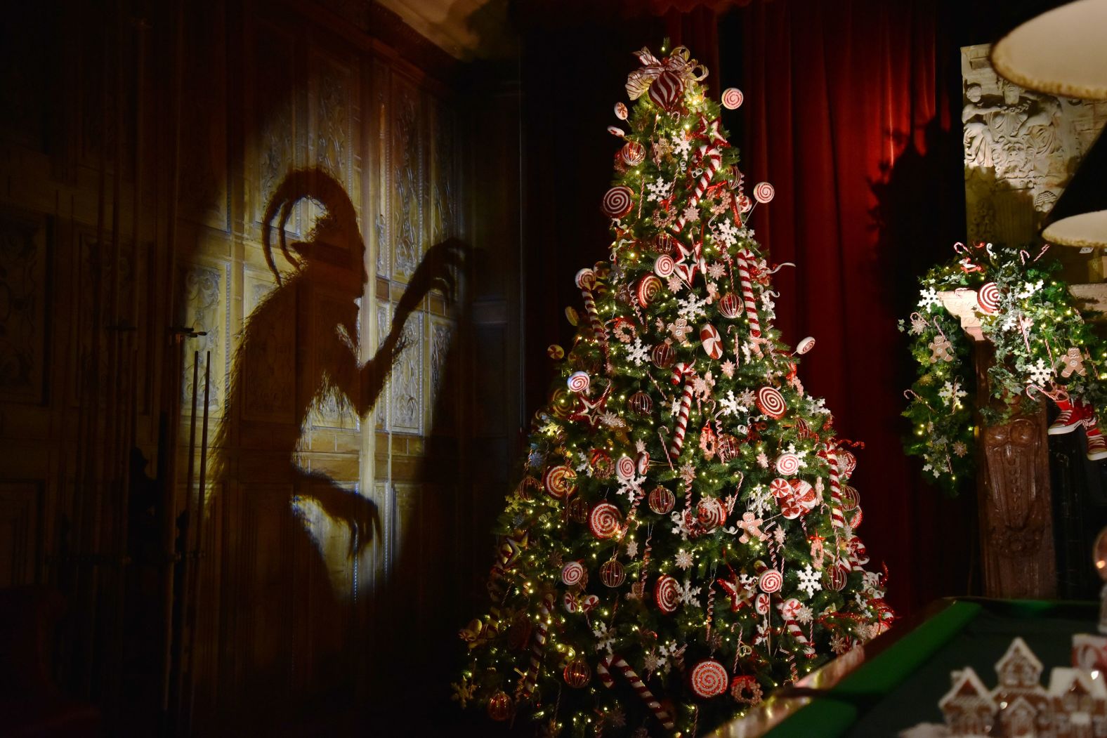 A room in Waddesdon Manor is decorated with German traditions, including the legend of the Krampus, as the manor launches its Grand Festive Tour in Aylesbury, England, on Sunday, November 23. The tour explores unique holiday traditions from across Europe.