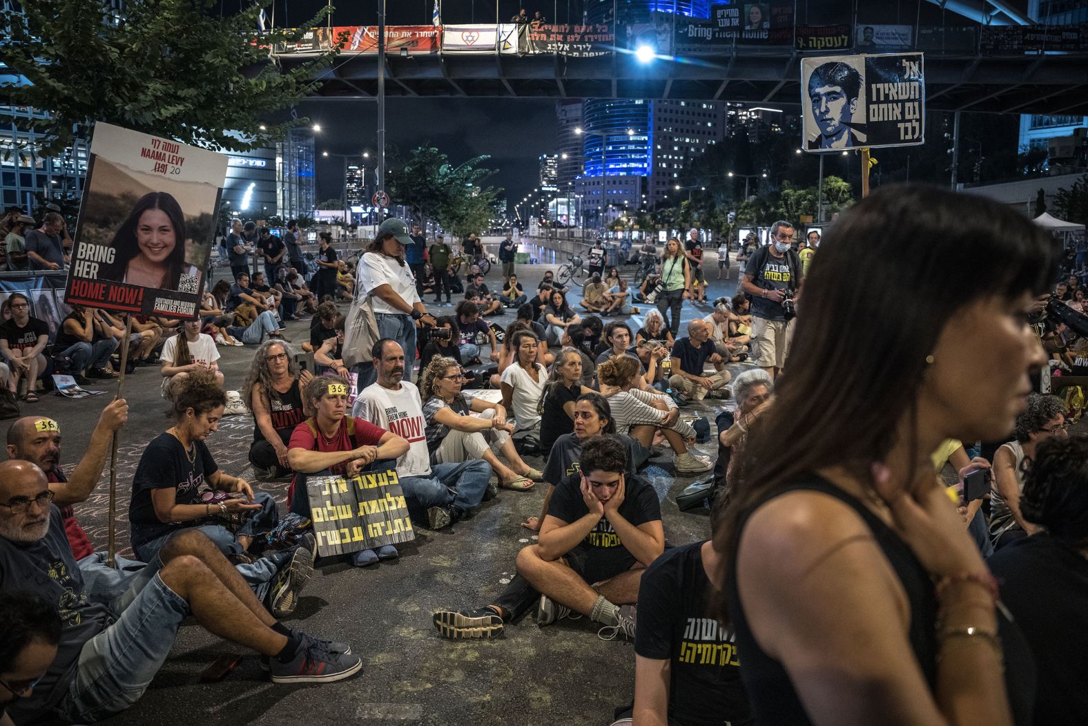 Protesters block a road outside the Israeli Ministry of Defense in Tel Aviv, Israel, on Monday, October 7. Many protesters have been <a href="index.php?page=&url=https%3A%2F%2Fwww.cnn.com%2Fworld%2Flive-news%2Fisrael-iran-attack-war-lebanon-10-05-24-intl-hnk%23cm1wi7gm400103b6o6p9x8aed">urging Israel’s government</a> to secure a deal with Hamas to free the remaining hostages.
