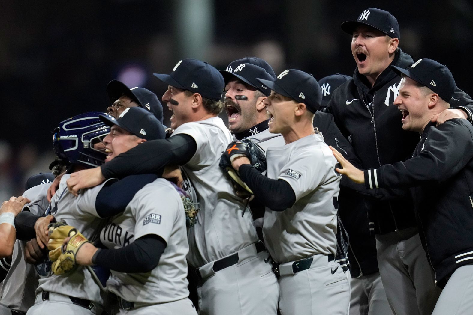 The New York Yankees celebrate after they defeated the Cleveland Guardians <a href="index.php?page=&url=https%3A%2F%2Fwww.cnn.com%2F2024%2F10%2F20%2Fsport%2Fyankees-clinch-world-series-berth-spt-intl%2Findex.html">to advance to the World Series</a> on Saturday, October 19. The Yankees will face the Los Angeles Dodgers in the Fall Classic.