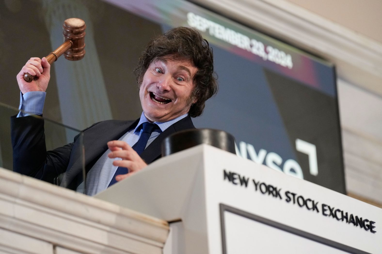 Argentina's President Javier Milei poses for pictures after ringing the opening bell at the New York Stock Exchange on Monday, September 23.