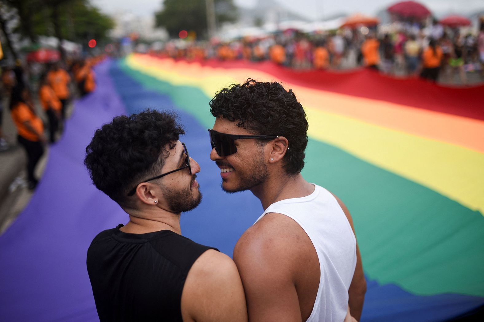 Revelers take part in the LGBTQ+ Pride Parade at Rio de Janeiro’s Copacabana beach on Sunday, November 23.