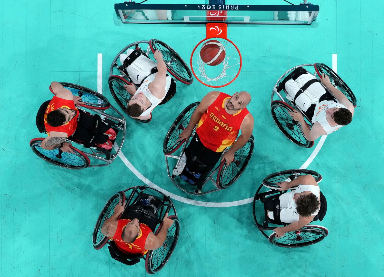 Paralympic athletes from the Netherlands and Spain compete in a wheelchair basketball game in Paris on Sunday, September 1.