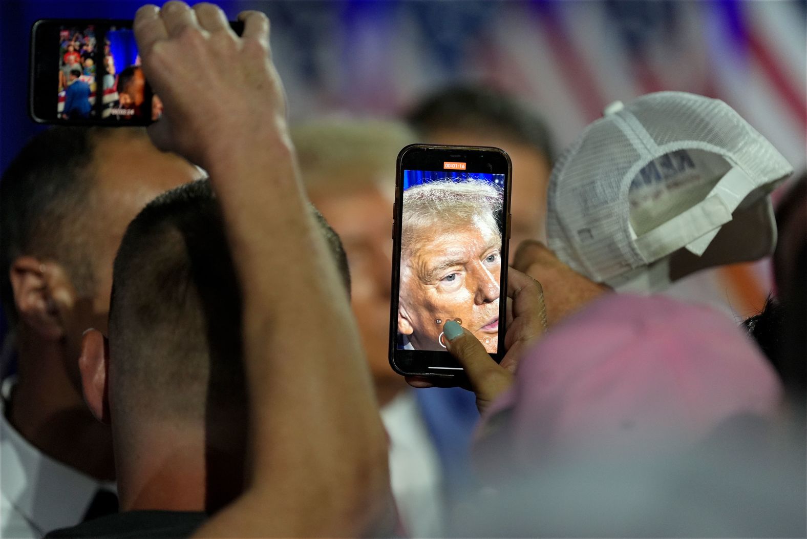 Former President Donald Trump greets supporters at a town hall with former Democratic Rep. Tulsi Gabbard in La Crosse, Wisconsin, on Thursday, August 29.