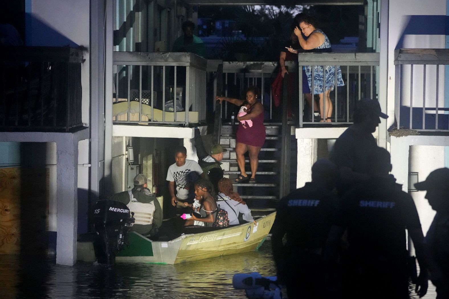 People are rescued from a flooded apartment complex in Clearwater, Florida, on Thursday, October 10, after <a href="index.php?page=&url=https%3A%2F%2Fwww.cnn.com%2F2024%2F10%2F08%2Fweather%2Fgallery%2Fhurricane-milton%2Findex.html">Hurricane Milton</a> swept through the area.
