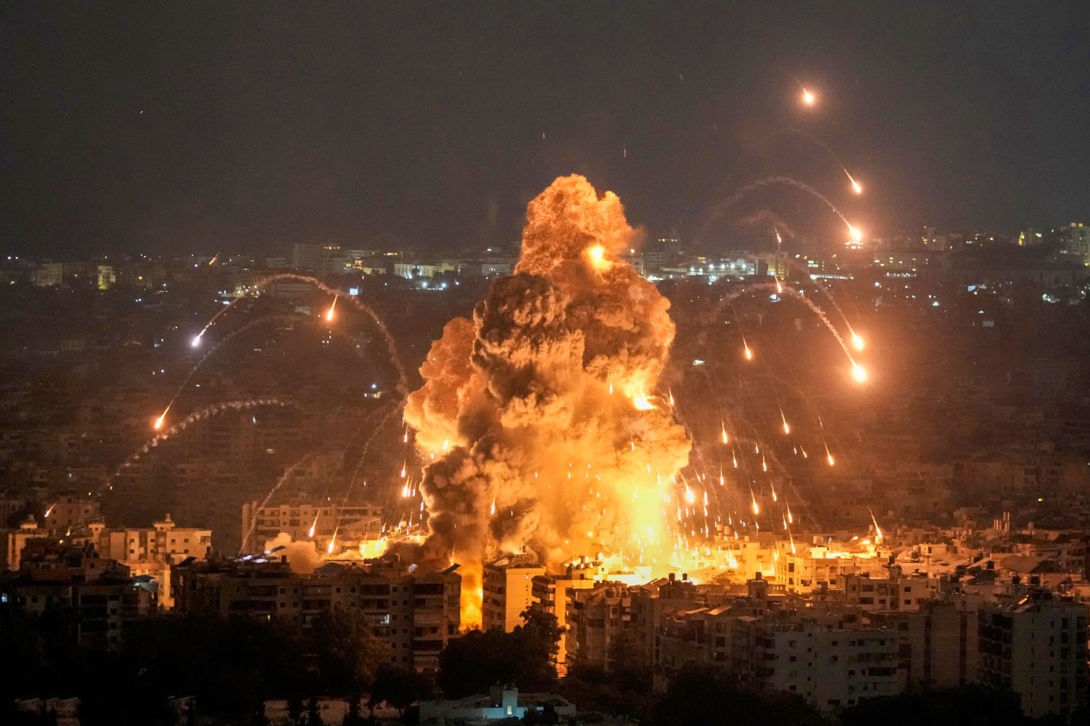 Flames and smoke rise from an Israeli airstrike in Beirut, Lebanon, on Sunday, October 6. Israel has launched an <a href="index.php?page=&url=https%3A%2F%2Fwww.cnn.com%2F2024%2F10%2F04%2Fmiddleeast%2Flebanon-israel-aerial-assault-intensity-intl%2Findex.html">extensive bombing campaign</a> against the Iran-backed militant group Hezbollah, which has a significant presence in the southern suburbs of Lebanon’s capital.