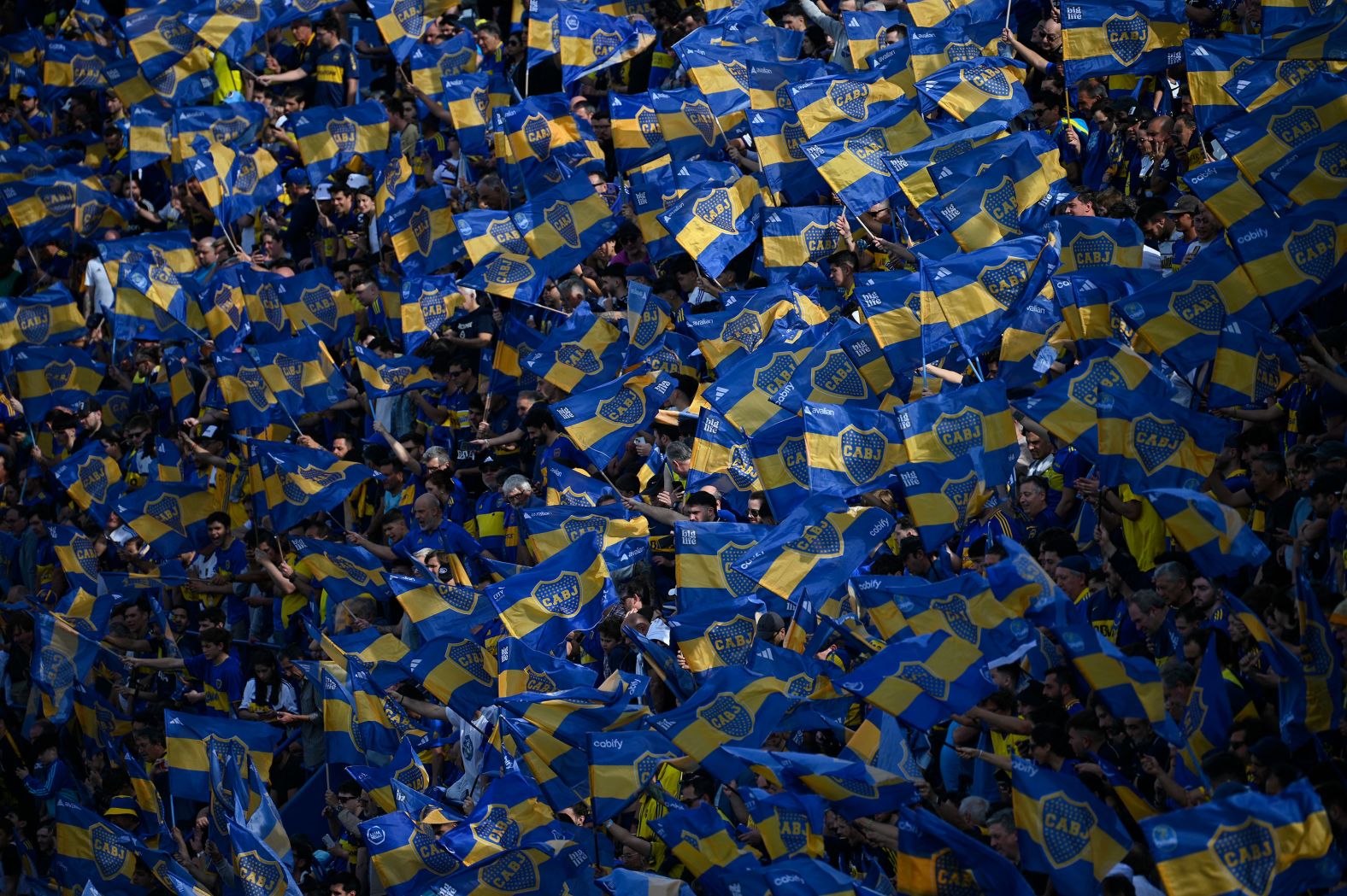 Fans of Boca Juniors cheer for their team during a soccer match between Boca Juniors and River Plate in Buenos Aires, Argentina, on Saturday, September 21.