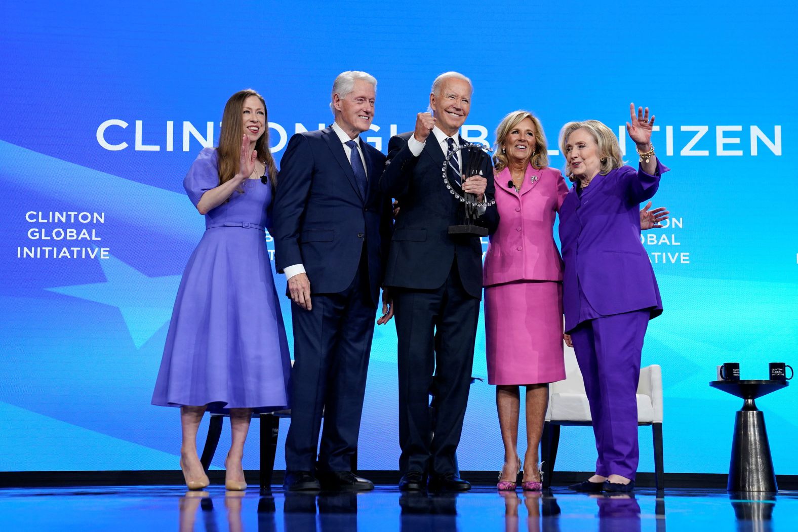 From left, Chelsea Clinton, Former President Bill Clinton, President Joe Biden, first lady Jill Biden and former Secretary of State Hillary Clinton stand together after President Biden received the Clinton Global Citizen Award in New York on Monday, September 23.