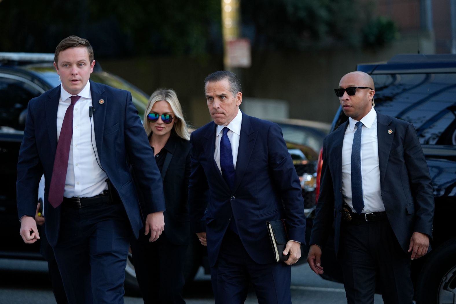 Hunter Biden, center, and his wife, Melissa Cohen Biden, arrive in federal court for his <a >felony tax trial</a> in Los Angeles on Thursday, September 5. Biden pleaded guilty to all nine charges he was facing, and District Judge Mark Scarsi accepted his plea. The guilty plea came in a convoluted all-day hearing on the same day that his trial was supposed to begin jury selection.