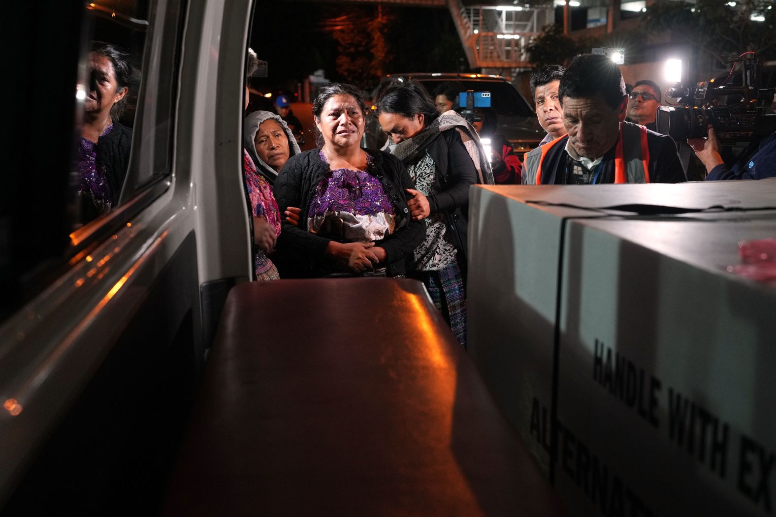 Vilma Perez cries next to the coffin of her daughter Maria Florinda Rios Perez De Velasquez at an airport in Guatemala City, Guatemala, on Sunday, November 23. An Indiana homeowner<a  href="/mt/?noimg=&dark=on&url=https%3a%2f%2fwww.cnn.com%2f2025%2f11%2f17%2fus%2findiana-house-cleaner-shot">was charged with involuntary manslaughter</a> after fatally shooting Rios, a Guatemalan immigrant who authorities say was part of a cleaning crew that went to the wrong house just before 7 a.m. on November 5.