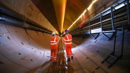 WATER ORTON, ENGLAND - SEPTEMBER 17: Mining engineers pose as they inspect the progress of the Mary Ann tunnel boring machine (TBM) in the HS2 Bromford Tunnel on September 17, 2024 in Water Orton, England. The construction of the Bromford tunnel, HS2's gateway to Birmingham, has reached the halfway point with the 1,600 tonne TBM, named 'Mary Ann' excavating 1.75 miles of the first bore of the 3.5 mile tunnel. (Photo by Christopher Furlong/Getty Images)