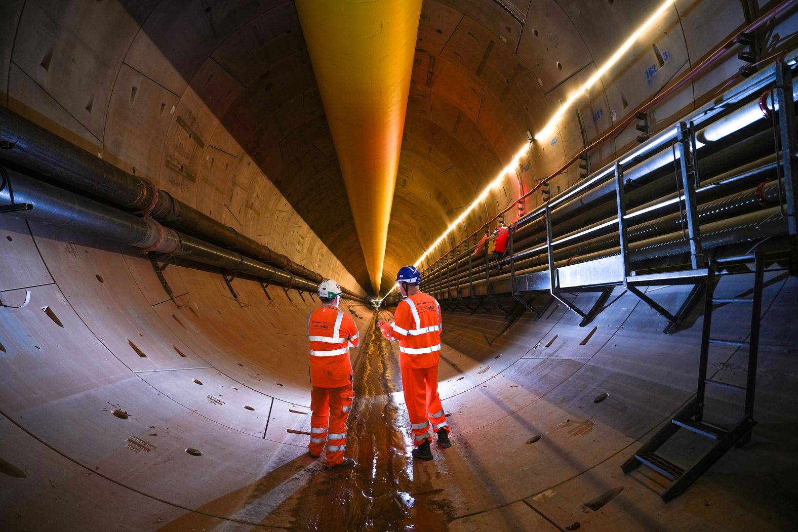 Mining engineers inspect the progress of the Bromford Tunnel in Water Orton, England, on Tuesday, September 17. The construction of the high-speed rail tunnel has reached the halfway point (1.75 miles).