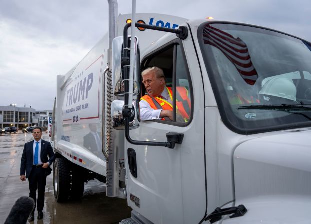 Trump speaks from a garbage truck in Green Bay, Wisconsin, on October 30. <a href=