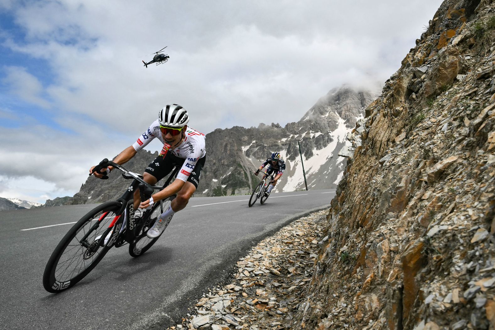 Cyclists João Almeida, left, and Primož Roglič compete in the fourth stage of the Tour de France, which ran from Pinerolo, Italy, to Valloire, France, on Tuesday, July 2. <a href="index.php?page=&url=https%3A%2F%2Fwww.cnn.com%2Finteractive%2F2024%2F06%2Fsport%2Fcycling-kristof-ramon-cnnphotos%2F">Related: These photos provide an inside look at the grueling world of professional cycling</a>.