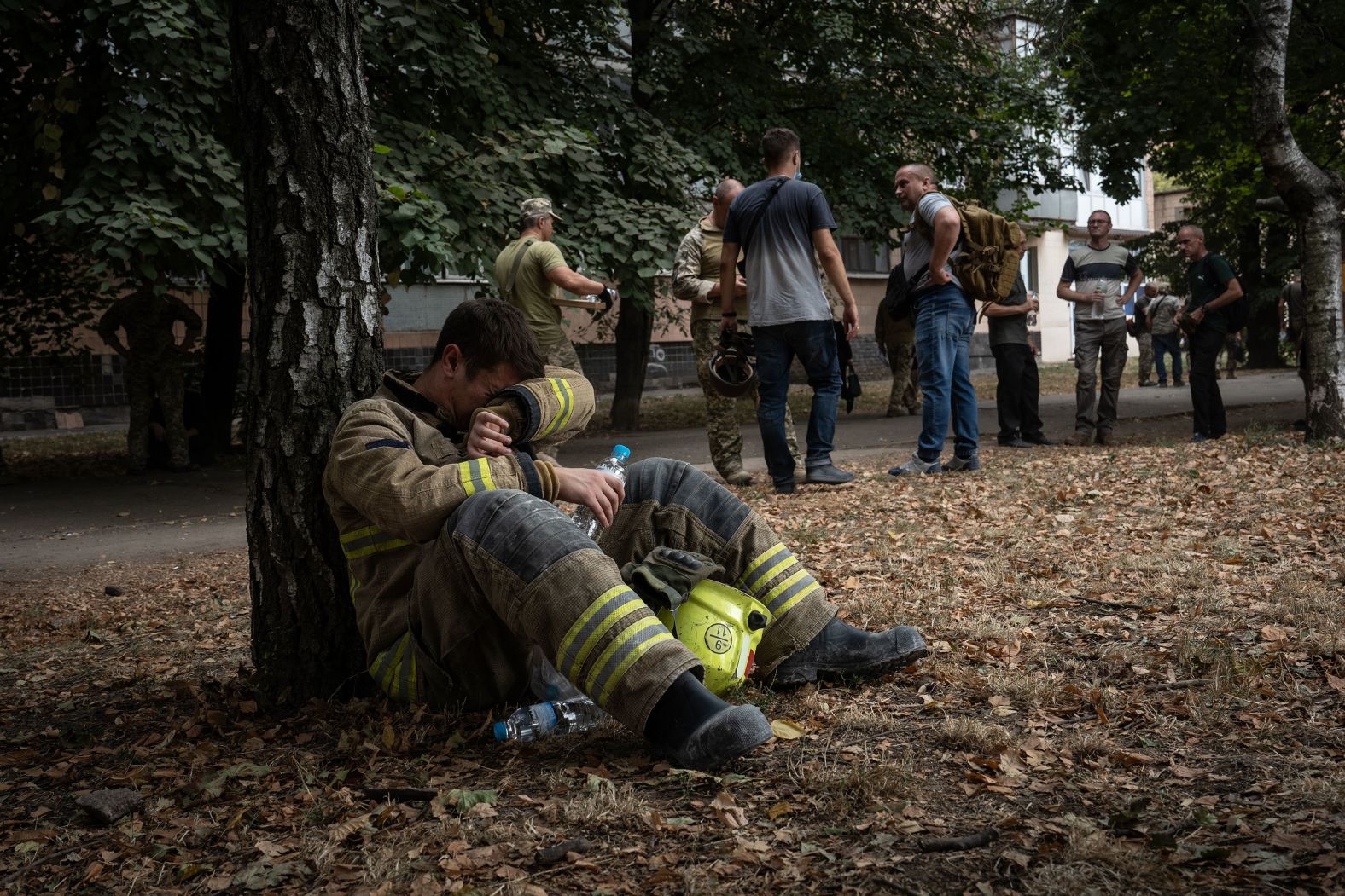 A Ukrainian emergency serviceman waits for an air raid siren to subside before resuming work at the site of a <a >Russian missile strike in Poltava</a>, Ukraine, on Wednesday, September 4. The strike, which targeted a military educational facility in central Ukraine, killed 51 people and injured more than 200 others, according to Ukrainian offiicias, in one of the deadliest single attacks since the start of Moscow’s full-scale invasion in February 2022.