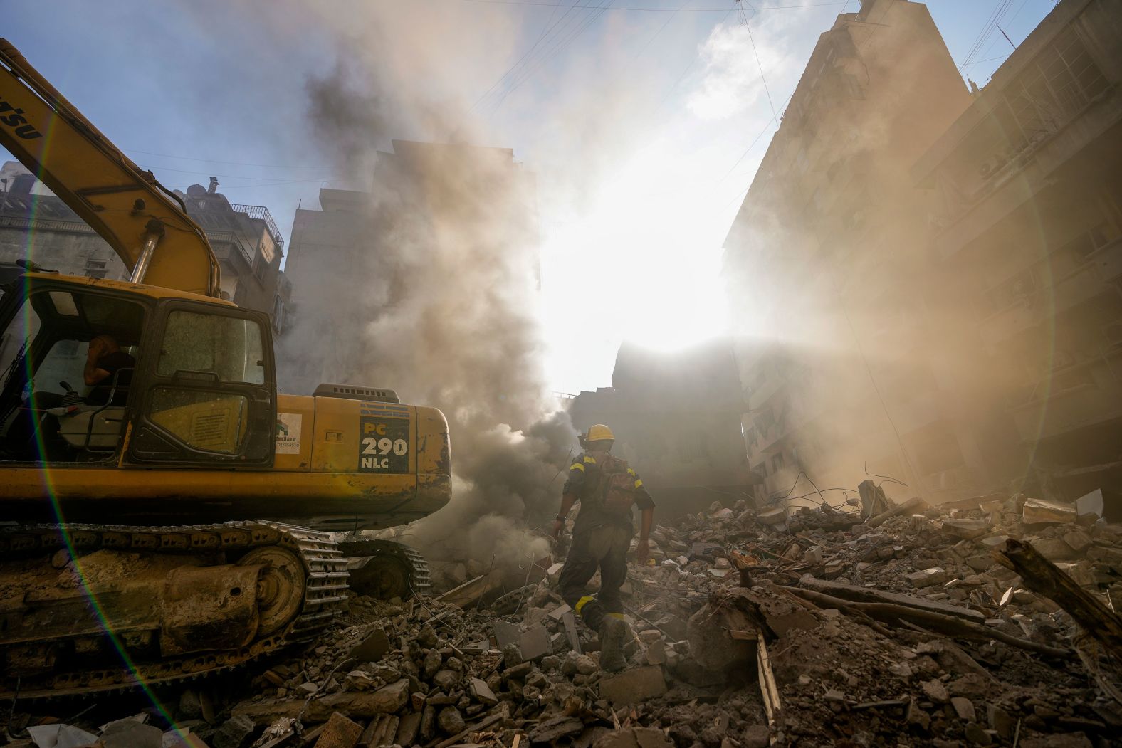 Rescue workers search for victims at the site of an Israeli airstrike in Beirut, Lebanon, on Friday, October 11. Israel has been pummeling Lebanon with an <a href="index.php?page=&url=https%3A%2F%2Fwww.cnn.com%2F2024%2F10%2F04%2Fmiddleeast%2Flebanon-israel-aerial-assault-intensity-intl%2Findex.html">unprecedented airstrike campaign</a> as it says it is targeting Hezbollah strongholds in the country.