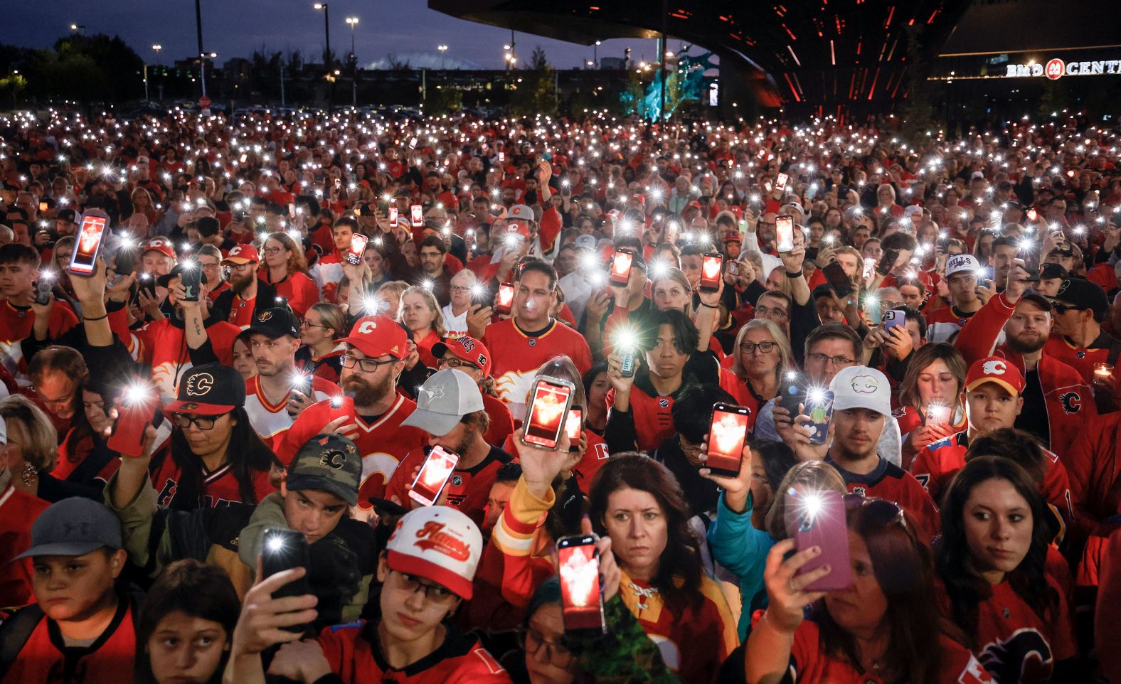 Fans attend a vigil for NHL player Johnny Gaudreau and his brother, Matthew, in Calgary, Alberta, on Wednesday, September 4. The brothers were <a >tragically killed</a> when they were hit by an SUV while riding their bikes in southern New Jersey on August 29. Johnny Gaudreau, who most recently played for the Columbus Blue Jackets, was drafted by the Calgary Flames in 2011 and played for the team until he signed with Columbus in 2022.