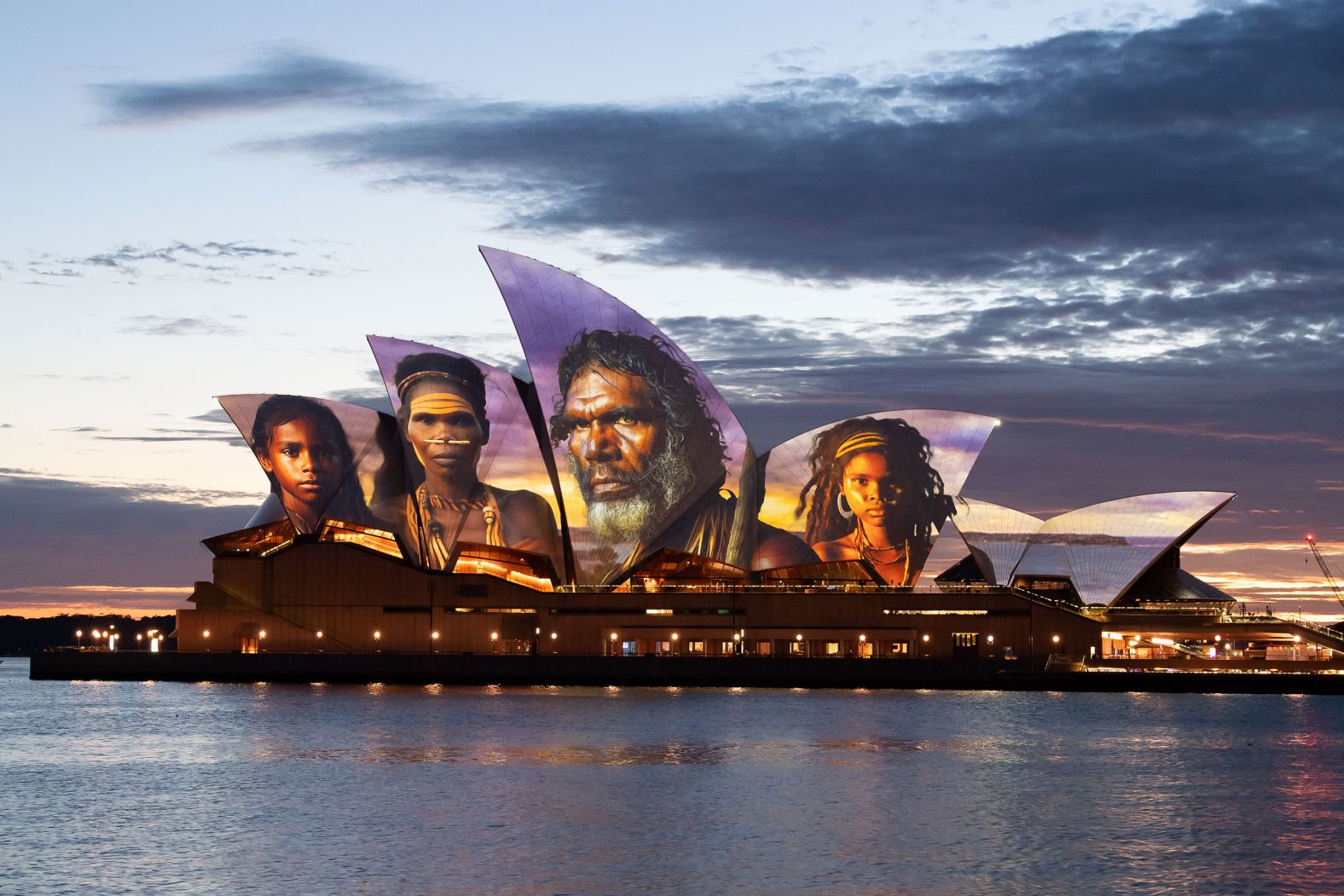 Indigenous artwork by artist Brett Leavy is projected onto the sails of the Sydney Opera House on Friday, January 26. It was Australia Day in the country, but <a href="index.php?page=&url=https%3A%2F%2Fwww.cnn.com%2F2024%2F01%2F26%2Faustralia%2Faustralia-day-national-rallies-2024-intl-hnk%2Findex.html">many Indigenous Australians view the national day as the anniversary of their colonial dispossession 236 years ago</a>.