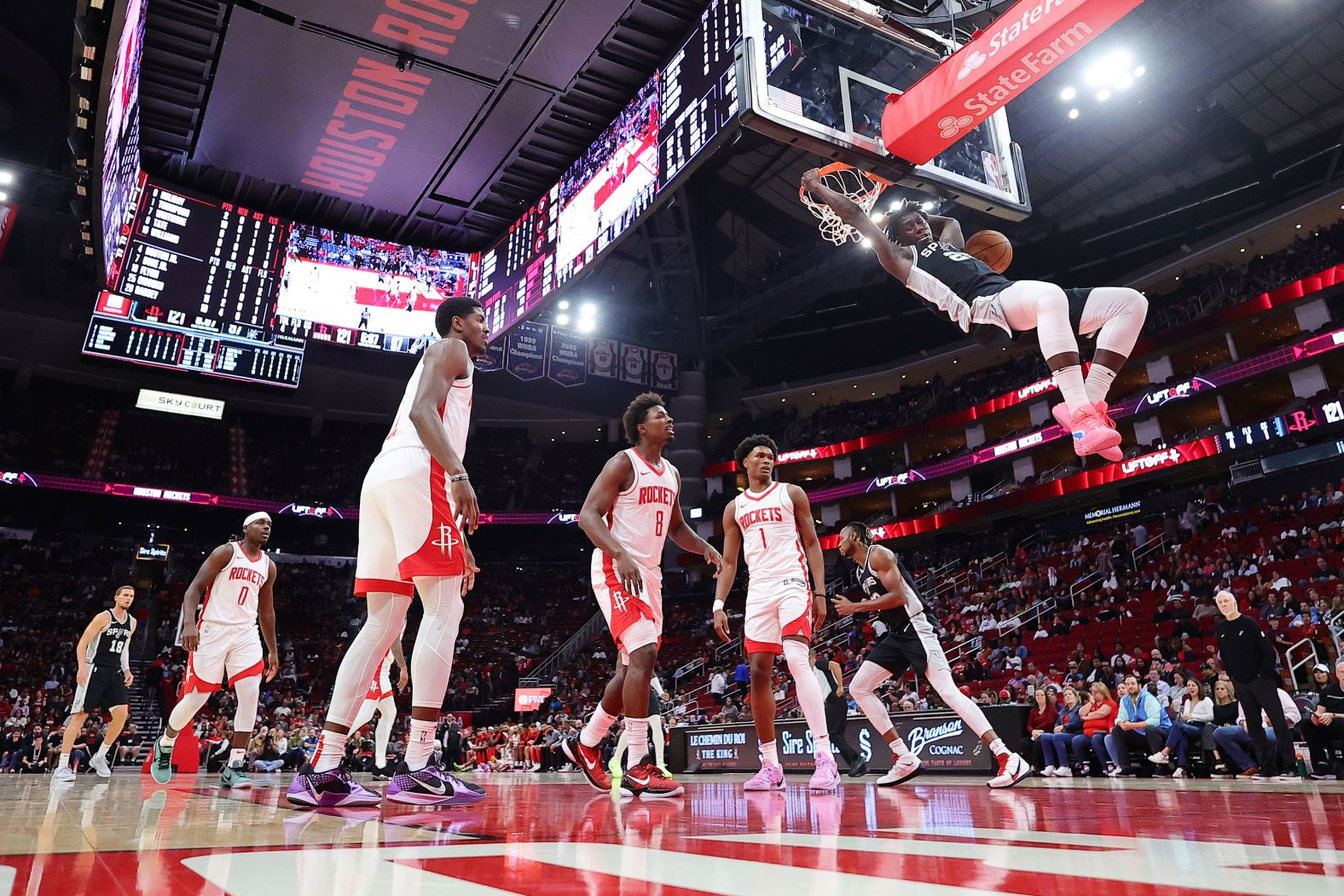 The San Antonio Spurs’ Sidy Cissoko dunks the ball during a preseason game in Houston on Thursday, October 17.