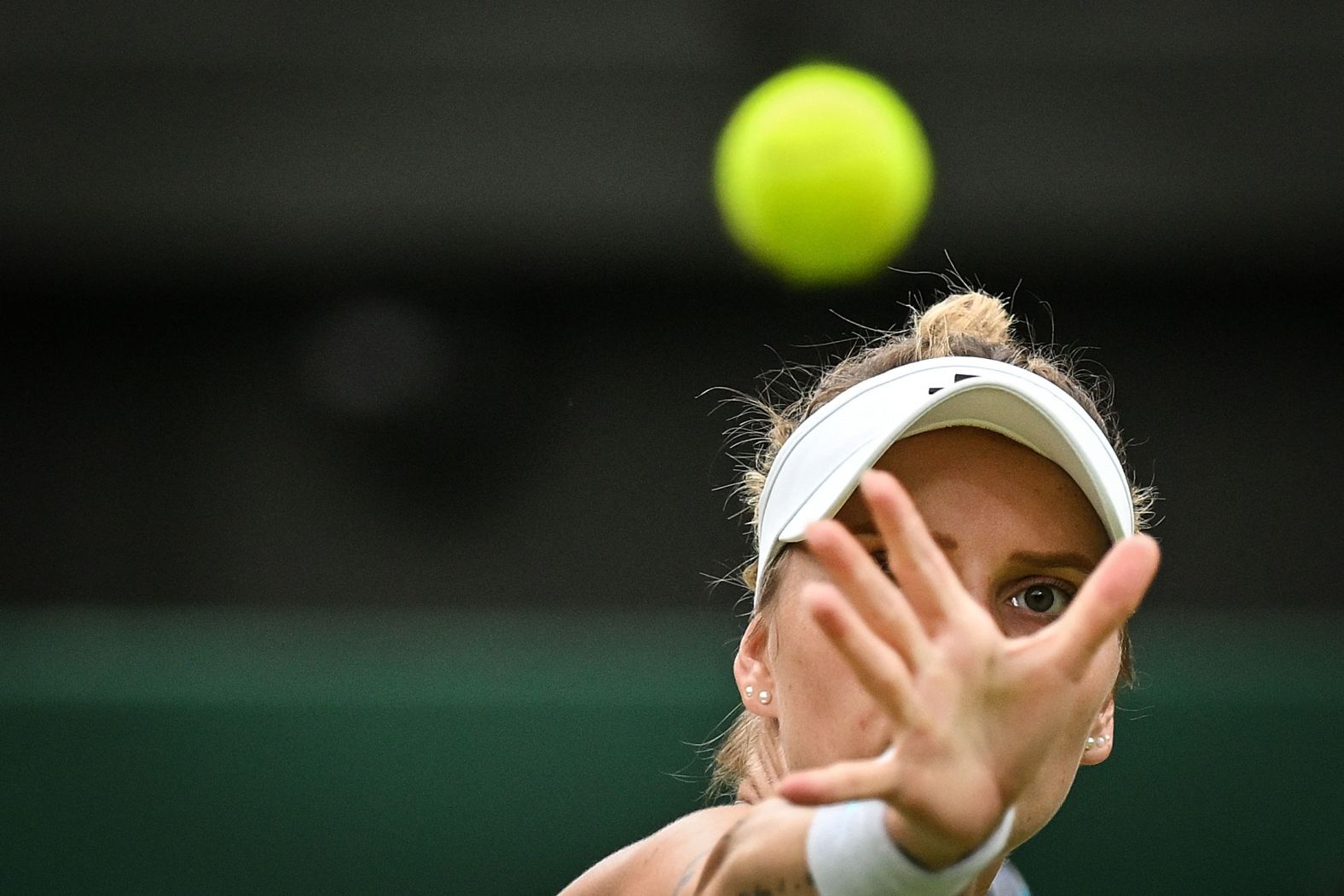 Markéta<strong> </strong>Vondroušová eyes the ball during her first-round match at Wimbledon on Tuesday, July 2. Vondroušová, the tournament’s defending champion, <a href="index.php?page=&url=https%3A%2F%2Fwww.cnn.com%2F2024%2F07%2F02%2Fsport%2Fmarketa-vondrousova-jessica-bouzas-maneiro-wimbledon-upset-spt-intl%2Findex.html">was stunned by Bouzas Maneiro</a> in straight sets, 6-4, 6-2.