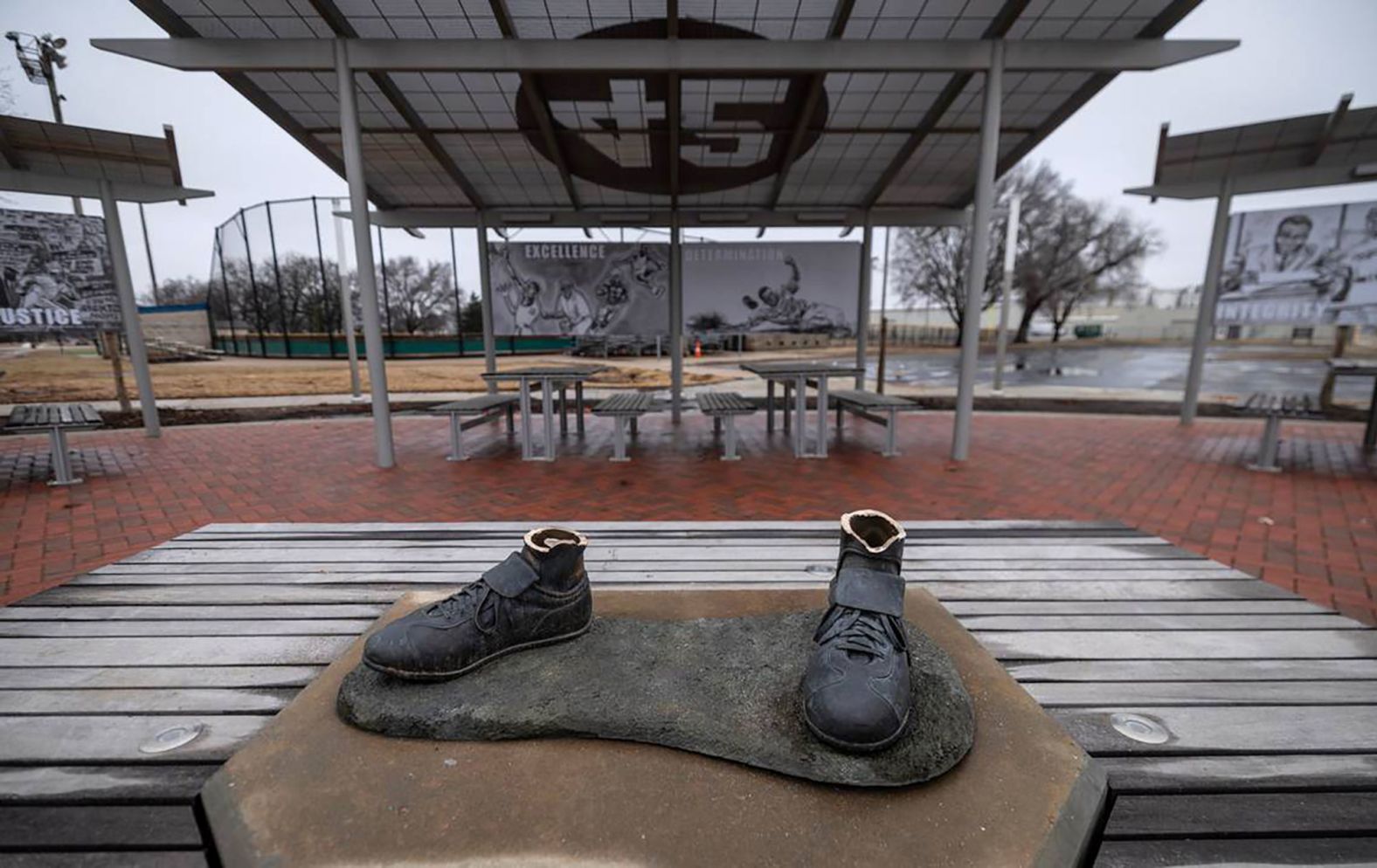 Only the feet remain of <a href="index.php?page=&url=https%3A%2F%2Fwww.cnn.com%2F2024%2F02%2F01%2Fus%2Fjackie-robinson-statue-replacement-funds-kansas%2Findex.html">a Jackie Robinson statue that was stolen and destroyed</a> last week from a field in Wichita, Kansas. Pieces of the statue were found burned in a public trash container on Tuesday, January 30, but a Kansas youth baseball league will be able to replace the statue after a flood of private donations and a commitment by Major League Baseball.