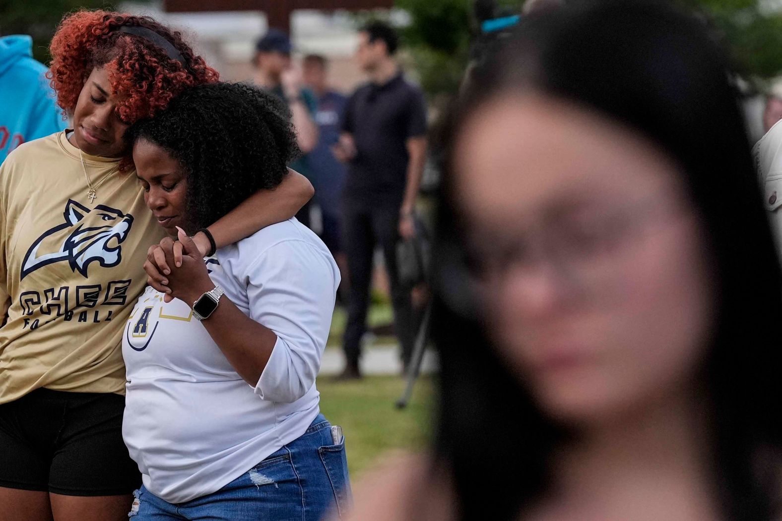 Mourners pray during a candlelight vigil for <a >the victims</a> of Wednesday’s <a >shooting at Apalachee High School</a>, in Winder, Georgia.