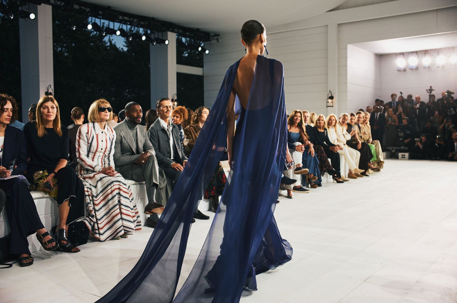 A model wears an evening gown during a Ralph Lauren fashion show in Bridgehampton, New York, on Friday, September 6. The show was held at Long Island’s Khalily Stables on the eve of <a >New York Fashion Week</a>.