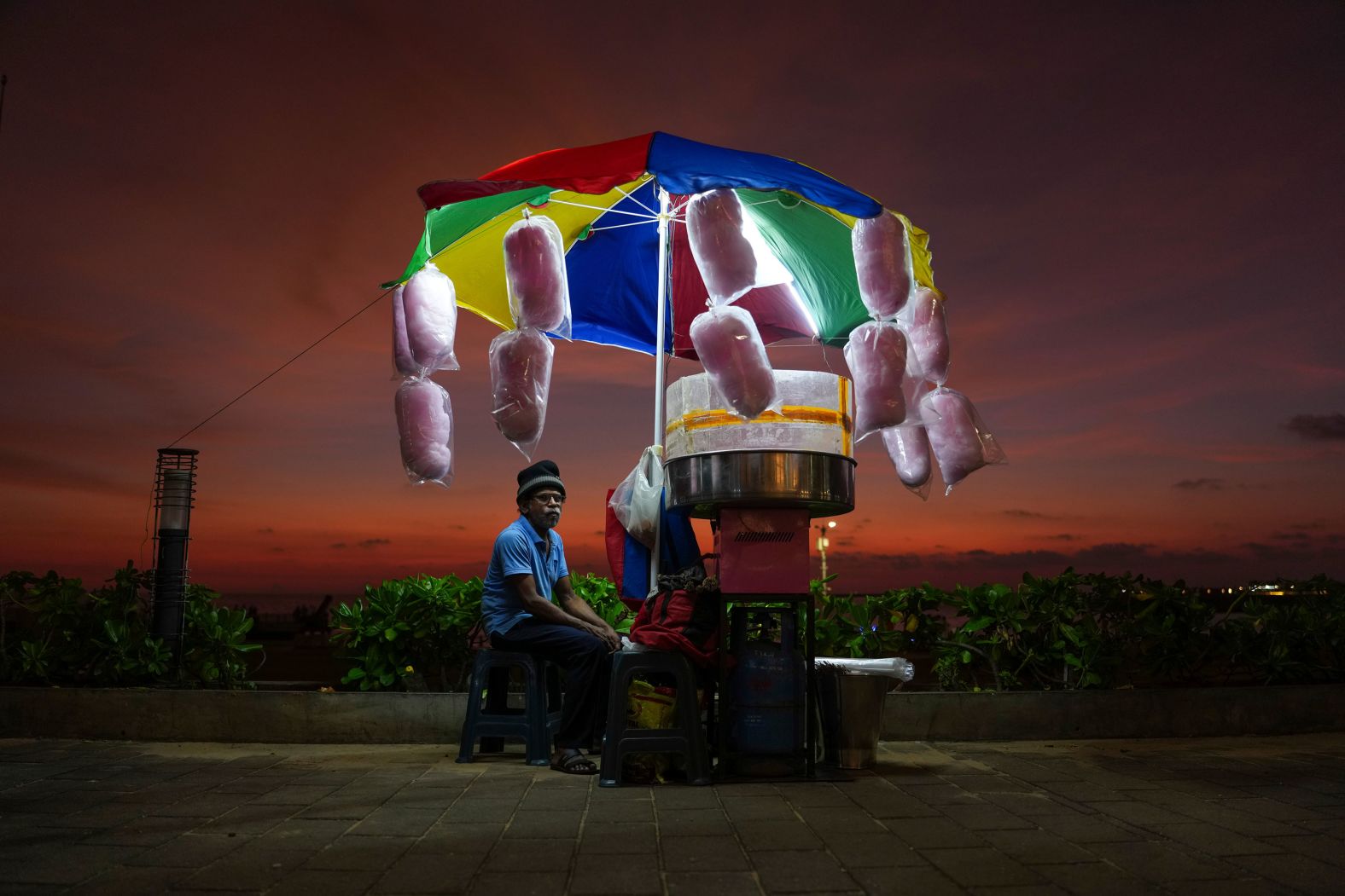 A cotton candy vendor waits for customers in Colombo, Sri Lanka, on Wednesday, October 30. <a href="index.php?page=&url=https%3A%2F%2Fwww.cnn.com%2F2024%2F10%2F24%2Fworld%2Fgallery%2Fphotos-this-week-october-17-october-24%2Findex.html">See last week in 32 photos</a>.