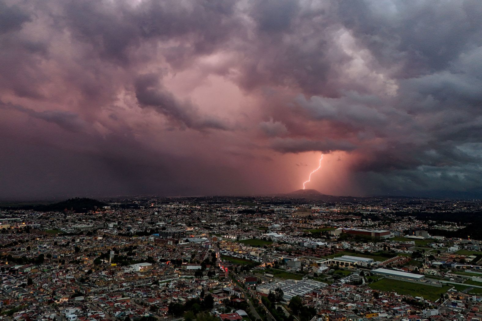 A lightning bolt strikes during a thunderstorm in Toluca, Mexico, on Tuesday, August 27. <a >See last week in 33 photos</a>.