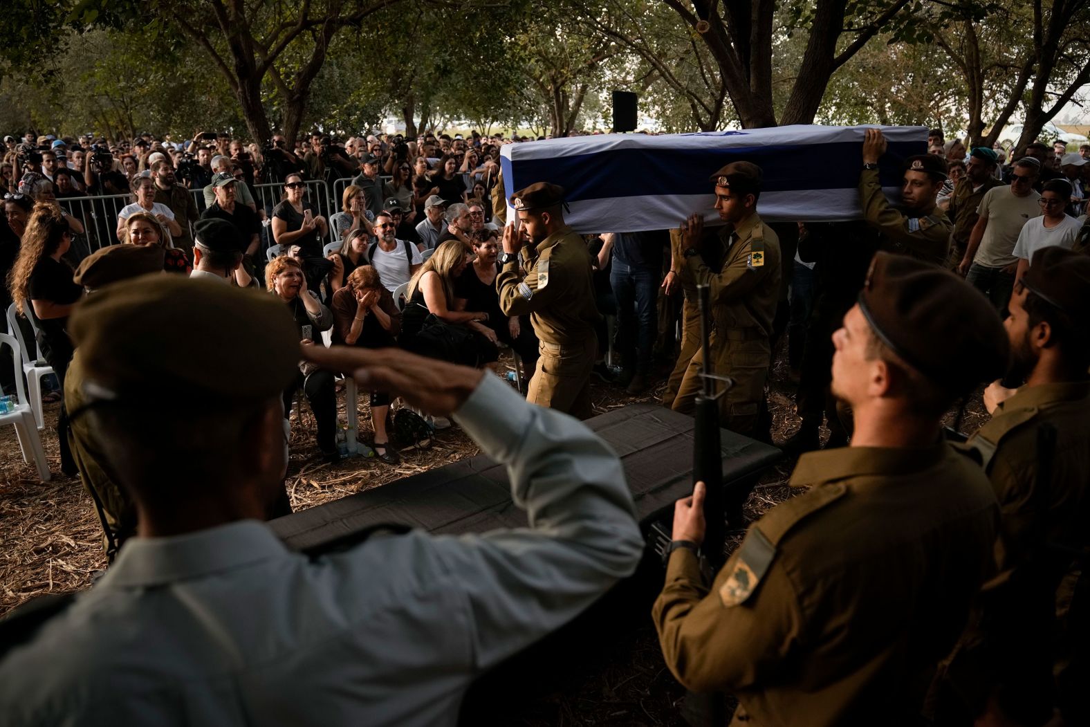 Israeli soldiers carry the flag-covered coffin of Sgt. Amitai Alon during his funeral near Ramot Naftali, Israel, on Monday, October 14. Alon was killed by a <a href="index.php?page=&url=https%3A%2F%2Fwww.cnn.com%2F2024%2F10%2F14%2Fmiddleeast%2Fhezbollah-attack-israel-weaknesses-drones-intl-cmd%2Findex.html">Hezbollah drone attack</a>, according to the Israel Defense Forces.
