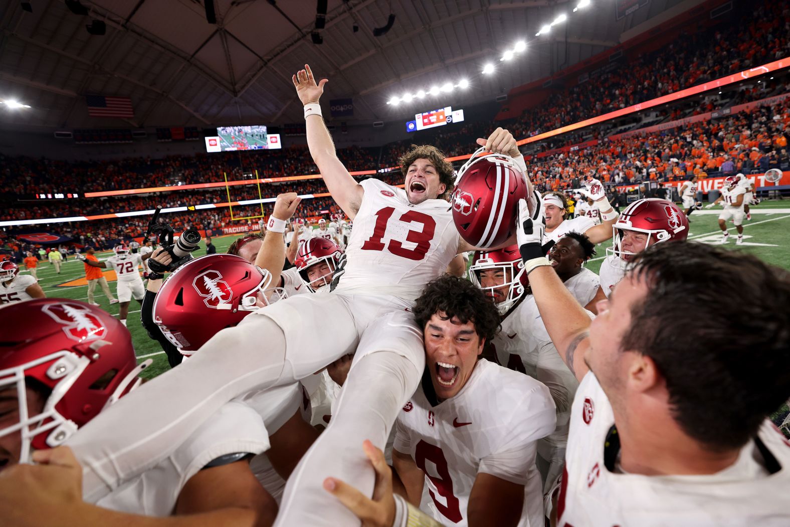 Stanford kicker Emmet Kenney celebrates with his teammates after kicking the game-winning field goal against the Syracuse Orange in Syracuse, New York, on Friday, September 20.
