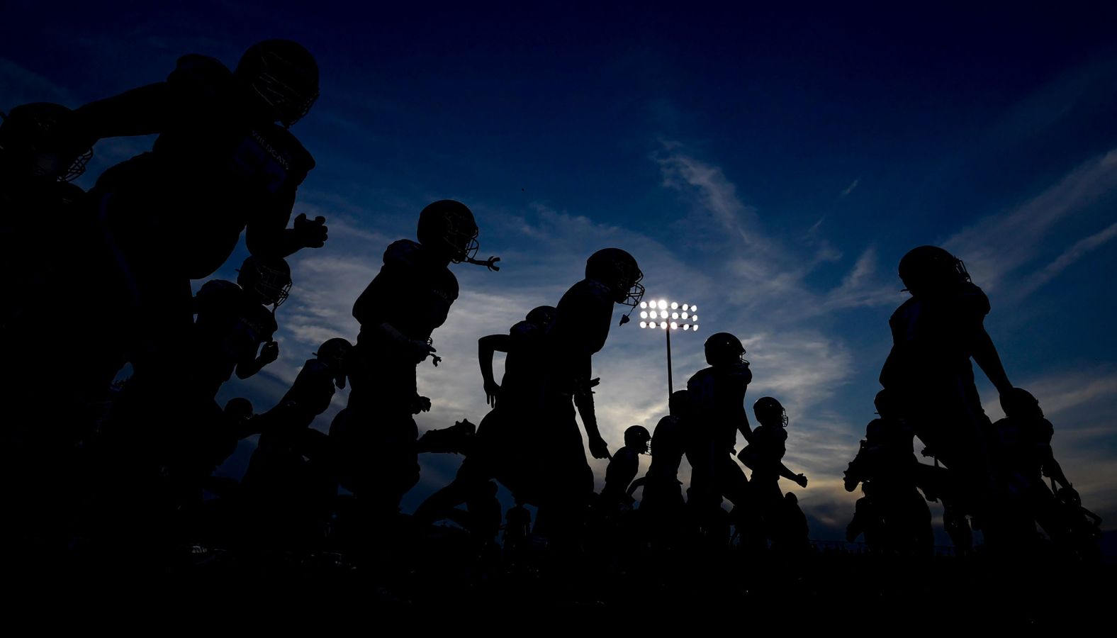 Football players from Trinity Presbyterian School take the field before a game in Mongomery, Alabama, on Friday, August 30. <a >See last week in 30 photos</a>.