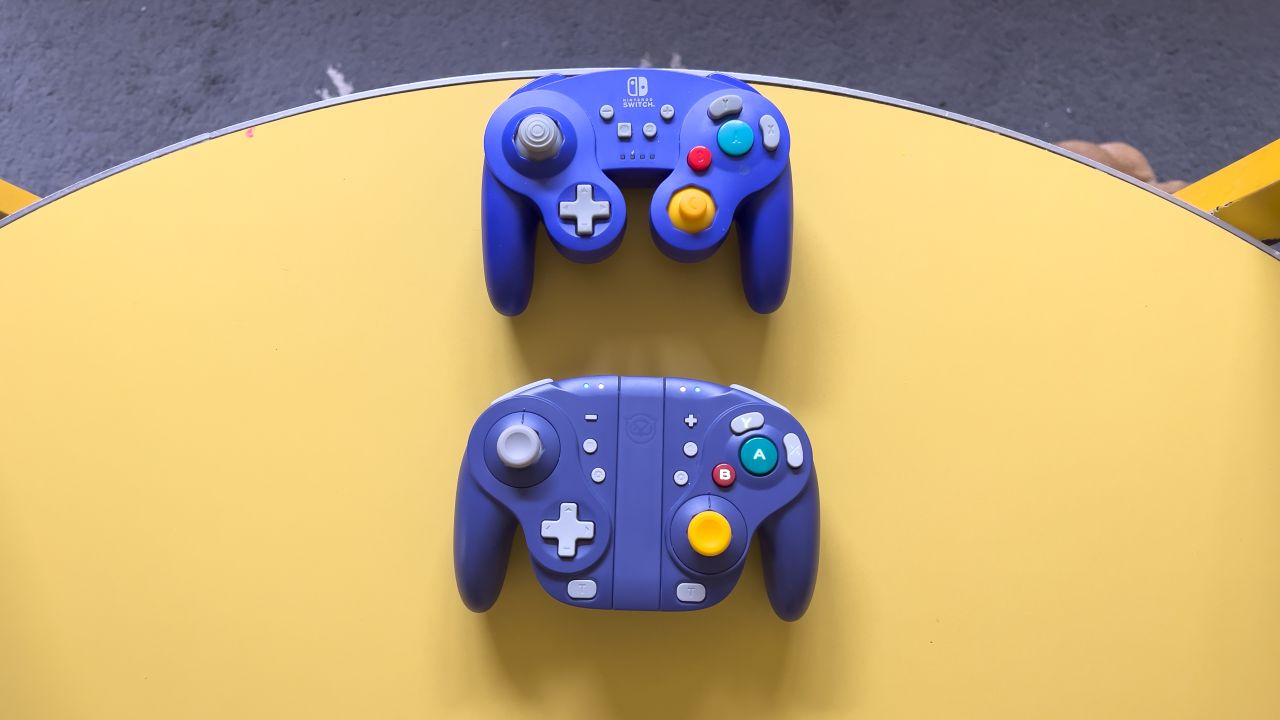 The Nyxi Wizard (bottom) is larger than the PowerA GameCube-style controller.