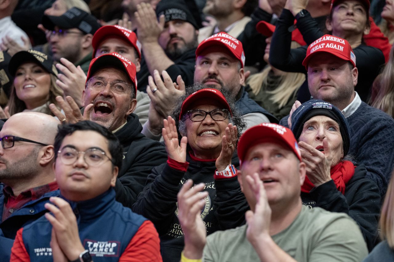 Trump supporters cheer inside Capital One Arena.