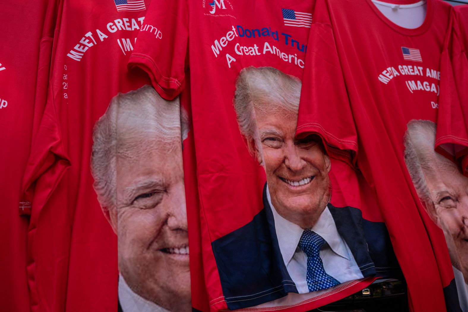 Trump shirts are sold outside the Fiserv Forum on Monday.