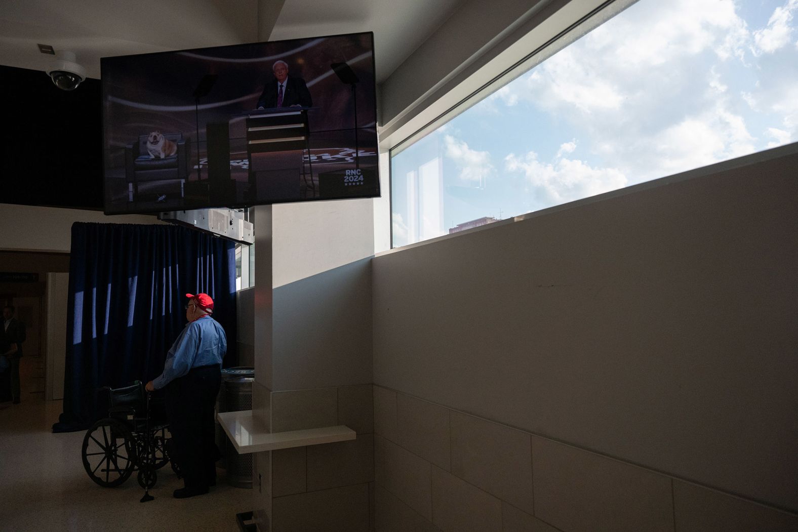 Justice's speech is seen on a monitor from the main concourse of the Fiserv Forum on Tuesday.