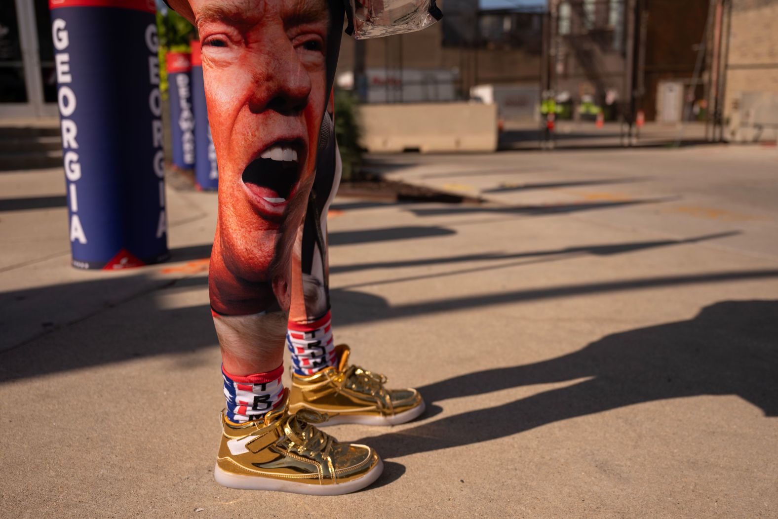 A woman wears Trump socks and leggings outside the convention on Thursday.