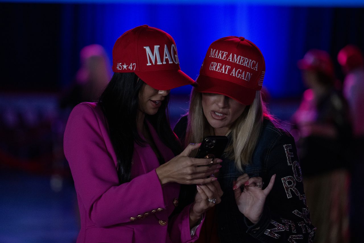 People in West Palm Beach, Florida, attend an election night watch party for former President Donald Trump.