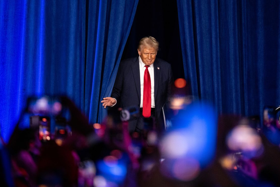 Former President Donald Trump emerges to speak at the Palm Beach County Convention Center in West Palm Beach, Florida, on Wednesday, November 6, 2024.