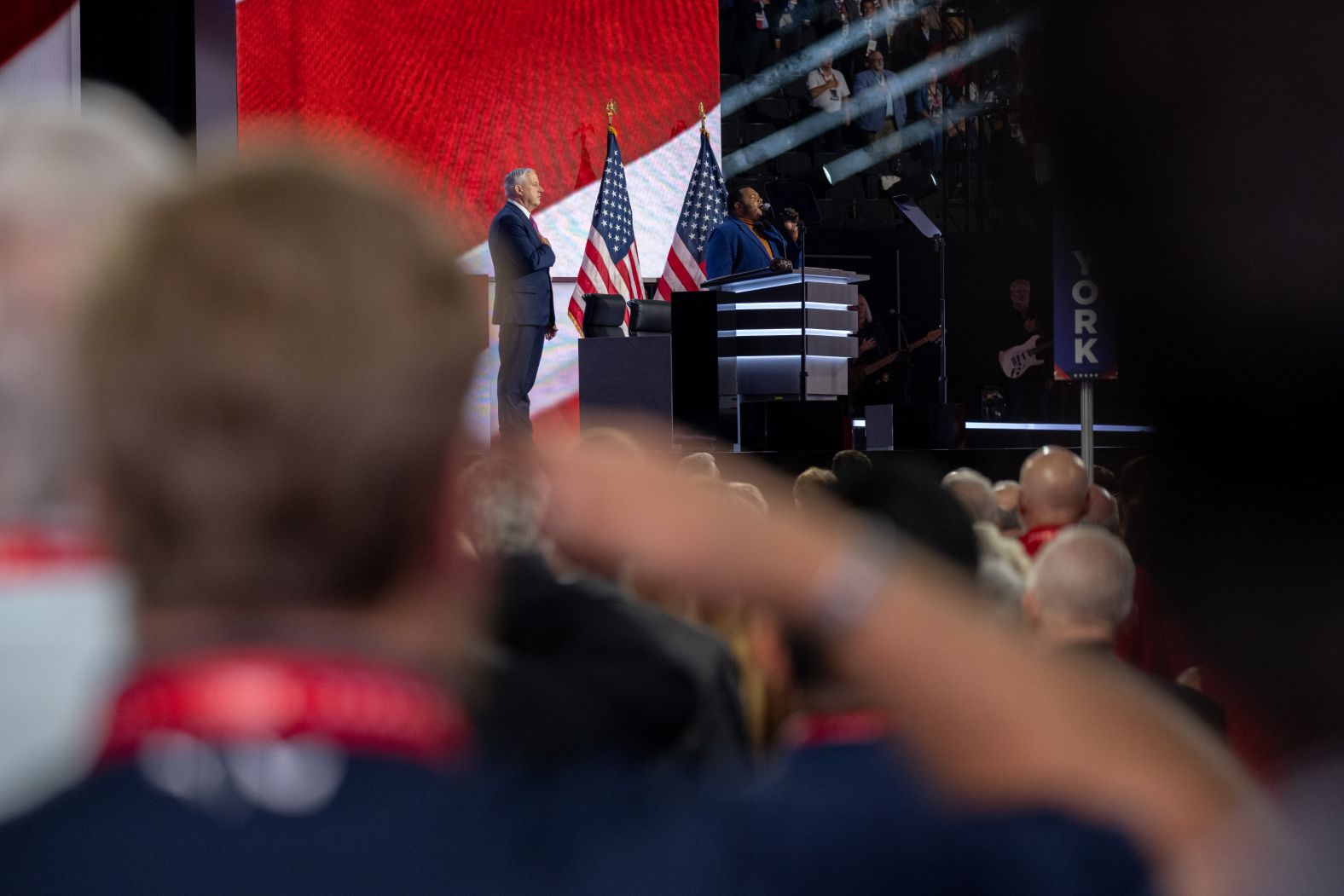 The national anthem is played at the start of the convention on Monday.