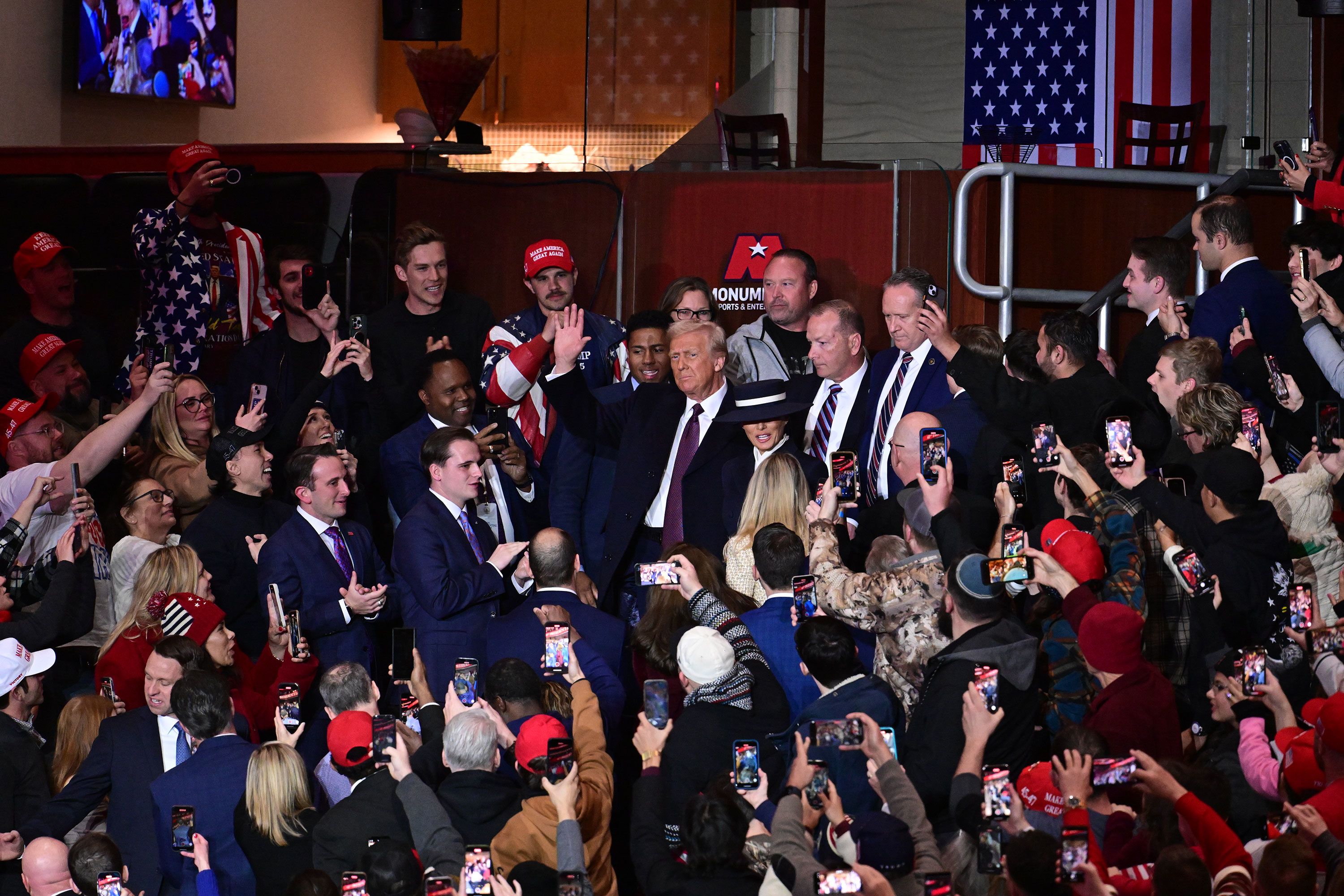 Trump arrives at Capital One Arena ahead of the parade on Monday.