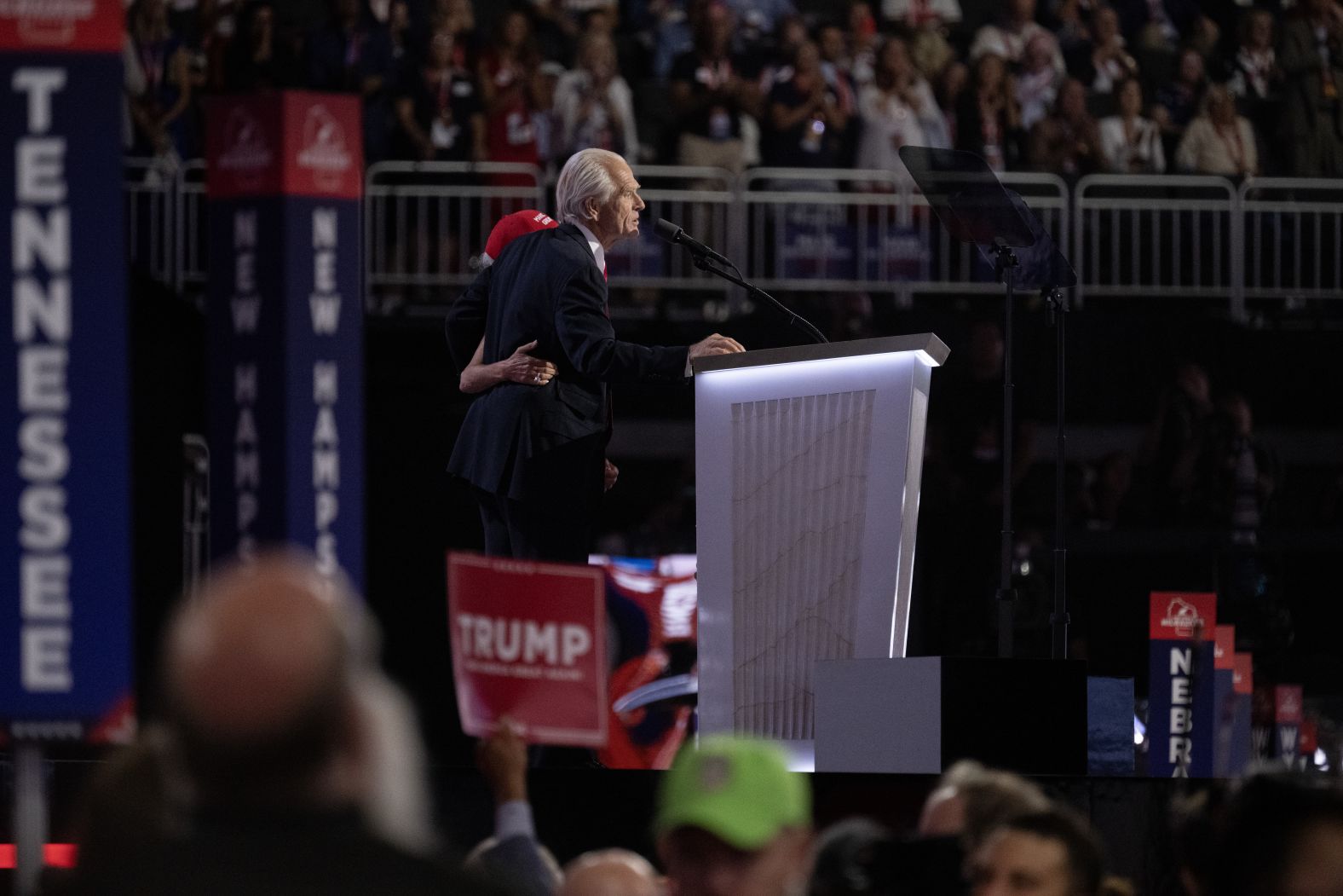 Former Trump White House adviser Peter Navarro was greeted by a cheering crowd before his speech. He traveled from Miami, where he was released from a federal prison Wednesday after completing his four-month sentence for?<a >defying a subpoena</a>?from the January 6 congressional committee.