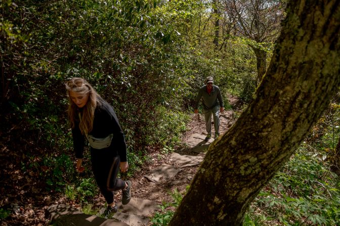 <strong>Getting outside:</strong> Hiking is one of the region's big draws. Here, hikers make their way along the Mount Pisgah Trail, located off the famed Blue Ridge Parkway.