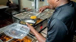 Clifford Simpson prepares a takeout order at Soul Good Fine Food in Atlanta, Georgia, on June 10, 2025. (Will Lanzoni/CNN)