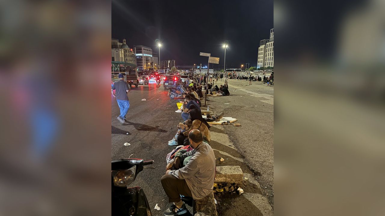 Displaced people gather at Beirut's central Martyrs' Square, as Israel strikes Beirut's southern suburbs on September 28, 2024.