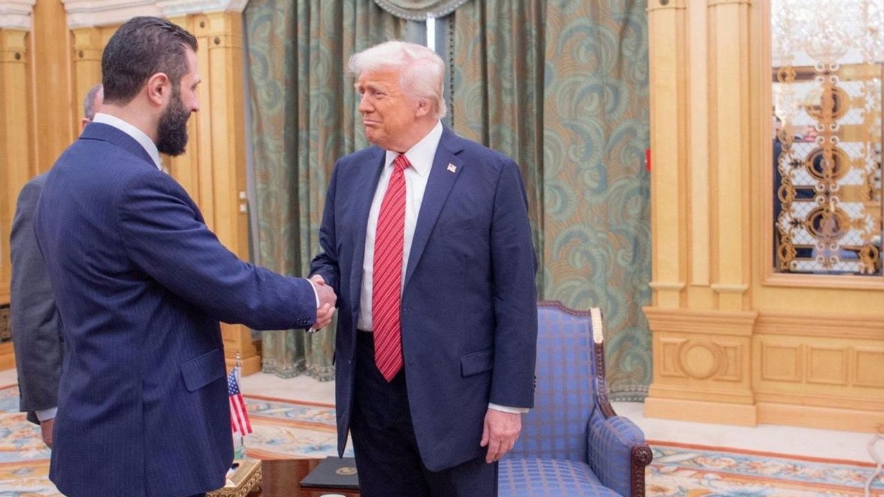 President Donald Trump meets with Syrian President Ahmed al-Sharaa in Riyadh, Saudi Arabia, in this handout released on May 14.